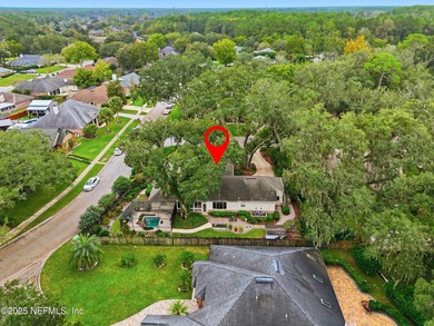 Nestled beneath a canopy of Mandarin oak trees, this