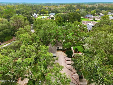 Nestled beneath a canopy of Mandarin oak trees, this