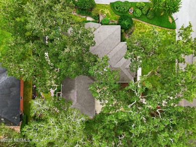 Nestled beneath a canopy of Mandarin oak trees, this