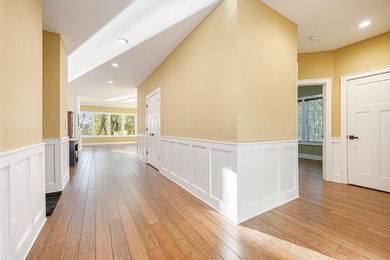 A must-see opportunity for serene, riverfront living in Allegan!