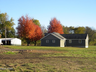 You can look along time and not find a prettier setting . house