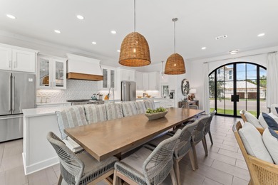 Discover this exquisite custom home on the east end of Scenic