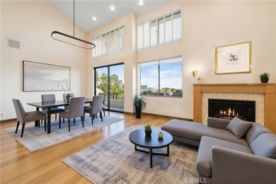 Perched on the top floor with soaring vaulted ceilings and