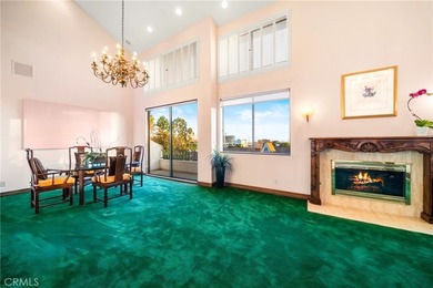 Perched on the top floor with soaring vaulted ceilings and
