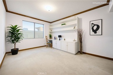 Perched on the top floor with soaring vaulted ceilings and