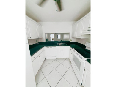 Move-in ready first-floor condo on the lake. This 2-bedroom