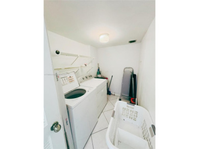 Move-in ready first-floor condo on the lake. This 2-bedroom