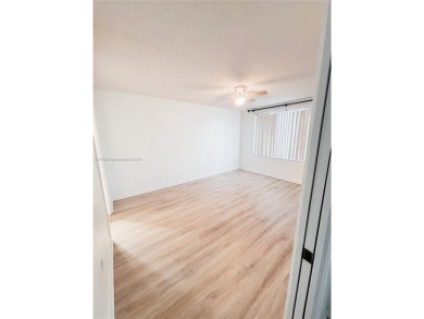 Move-in ready first-floor condo on the lake. This 2-bedroom