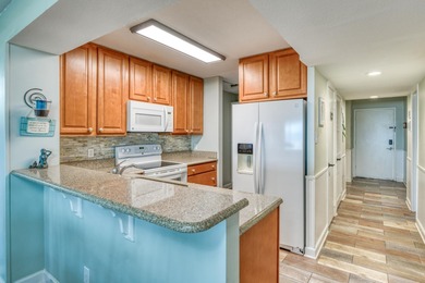 Welcome to the top-floor, direct oceanfront condo in the gated