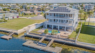 Experience enhanced waterfront living in this custom-built 3,208