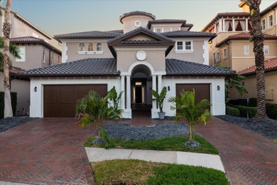 Located within the exclusive gated waterfront community of