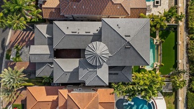 Located within the exclusive gated waterfront community of