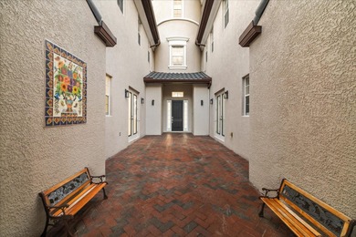 Located within the exclusive gated waterfront community of