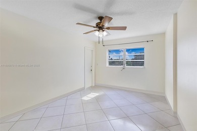 Bright and spacious corner unit with 1 bed, 1.5 baths, and a
