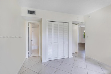 Bright and spacious corner unit with 1 bed, 1.5 baths, and a