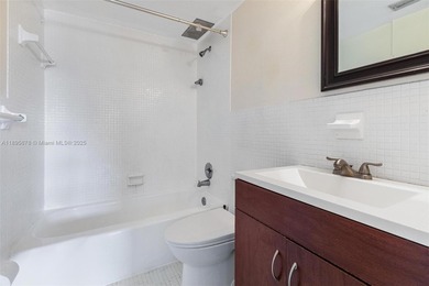 Bright and spacious corner unit with 1 bed, 1.5 baths, and a