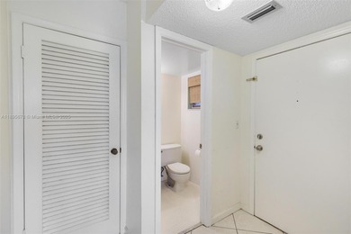 Bright and spacious corner unit with 1 bed, 1.5 baths, and a
