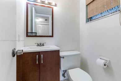 Bright and spacious corner unit with 1 bed, 1.5 baths, and a