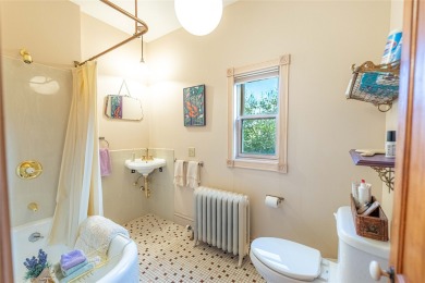 A rare offering... This beautiful 2 bedroom/2 bath Victorian