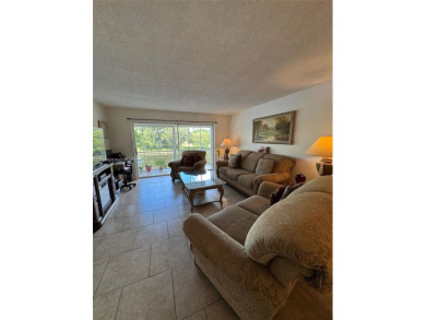Serene living room and the bedroom in this spacious 2nd-floor