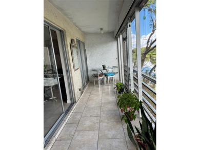 Serene living room and the bedroom in this spacious 2nd-floor