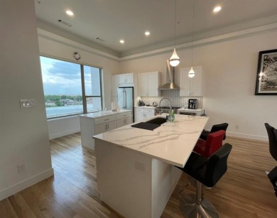 Sunsets, Style & Sophistication - Your Dream Townhome Awaits
