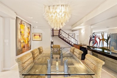 Upgraded lakefront 4-bedroom, 3.5-bath residence featuring a