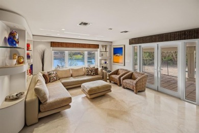 Upgraded lakefront 4-bedroom, 3.5-bath residence featuring a