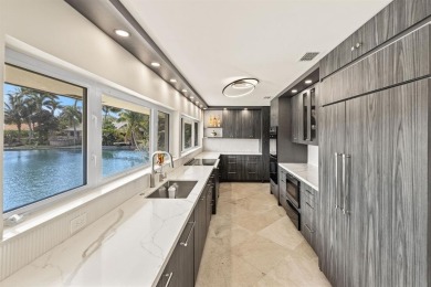 Upgraded lakefront 4-bedroom, 3.5-bath residence featuring a