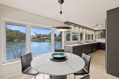 Upgraded lakefront 4-bedroom, 3.5-bath residence featuring a