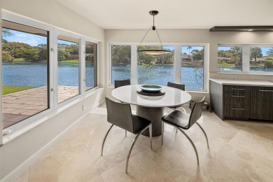 Upgraded lakefront 4-bedroom, 3.5-bath residence featuring a