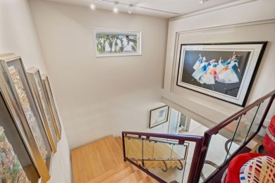 Upgraded lakefront 4-bedroom, 3.5-bath residence featuring a