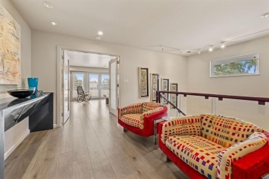 Upgraded lakefront 4-bedroom, 3.5-bath residence featuring a