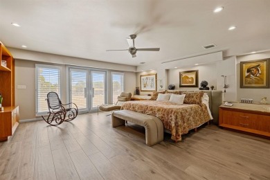 Upgraded lakefront 4-bedroom, 3.5-bath residence featuring a