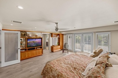 Upgraded lakefront 4-bedroom, 3.5-bath residence featuring a