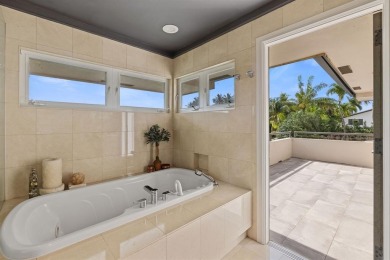 Upgraded lakefront 4-bedroom, 3.5-bath residence featuring a