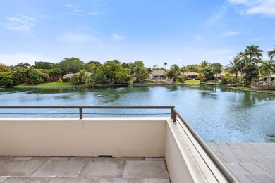 Upgraded lakefront 4-bedroom, 3.5-bath residence featuring a