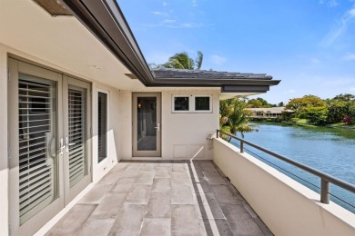 Upgraded lakefront 4-bedroom, 3.5-bath residence featuring a