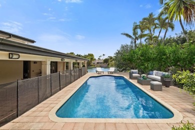 Upgraded lakefront 4-bedroom, 3.5-bath residence featuring a