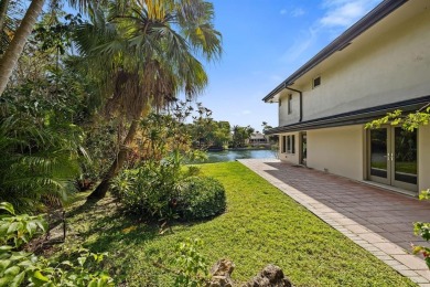 Upgraded lakefront 4-bedroom, 3.5-bath residence featuring a