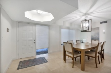 Enjoy the Florida lifestyle in this gorgeous 1st-floor condo in