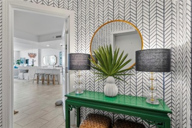 Luxury meets lifestyle in this top-floor Water Club Snell Isle