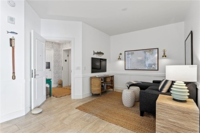 Luxury meets lifestyle in this top-floor Water Club Snell Isle