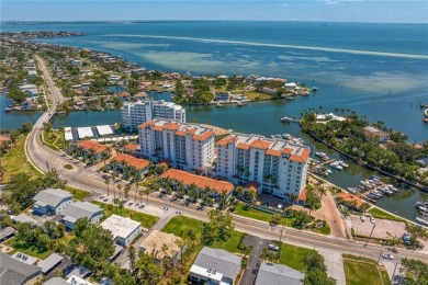 Luxury meets lifestyle in this top-floor Water Club Snell Isle