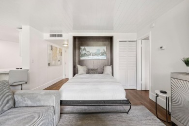 GORGEOUS TOTALLY REMODELED 1 BEDROOM 1 1/2 BATH 1ST FLOOR UNIT