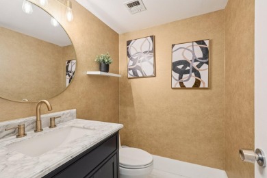 GORGEOUS TOTALLY REMODELED 1 BEDROOM 1 1/2 BATH 1ST FLOOR UNIT