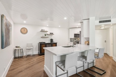 GORGEOUS TOTALLY REMODELED 1 BEDROOM 1 1/2 BATH 1ST FLOOR UNIT