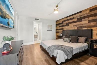 GORGEOUS TOTALLY REMODELED 1 BEDROOM 1 1/2 BATH 1ST FLOOR UNIT