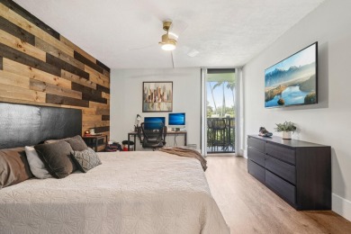 GORGEOUS TOTALLY REMODELED 1 BEDROOM 1 1/2 BATH 1ST FLOOR UNIT