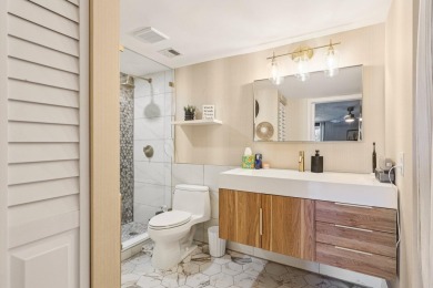 GORGEOUS TOTALLY REMODELED 1 BEDROOM 1 1/2 BATH 1ST FLOOR UNIT